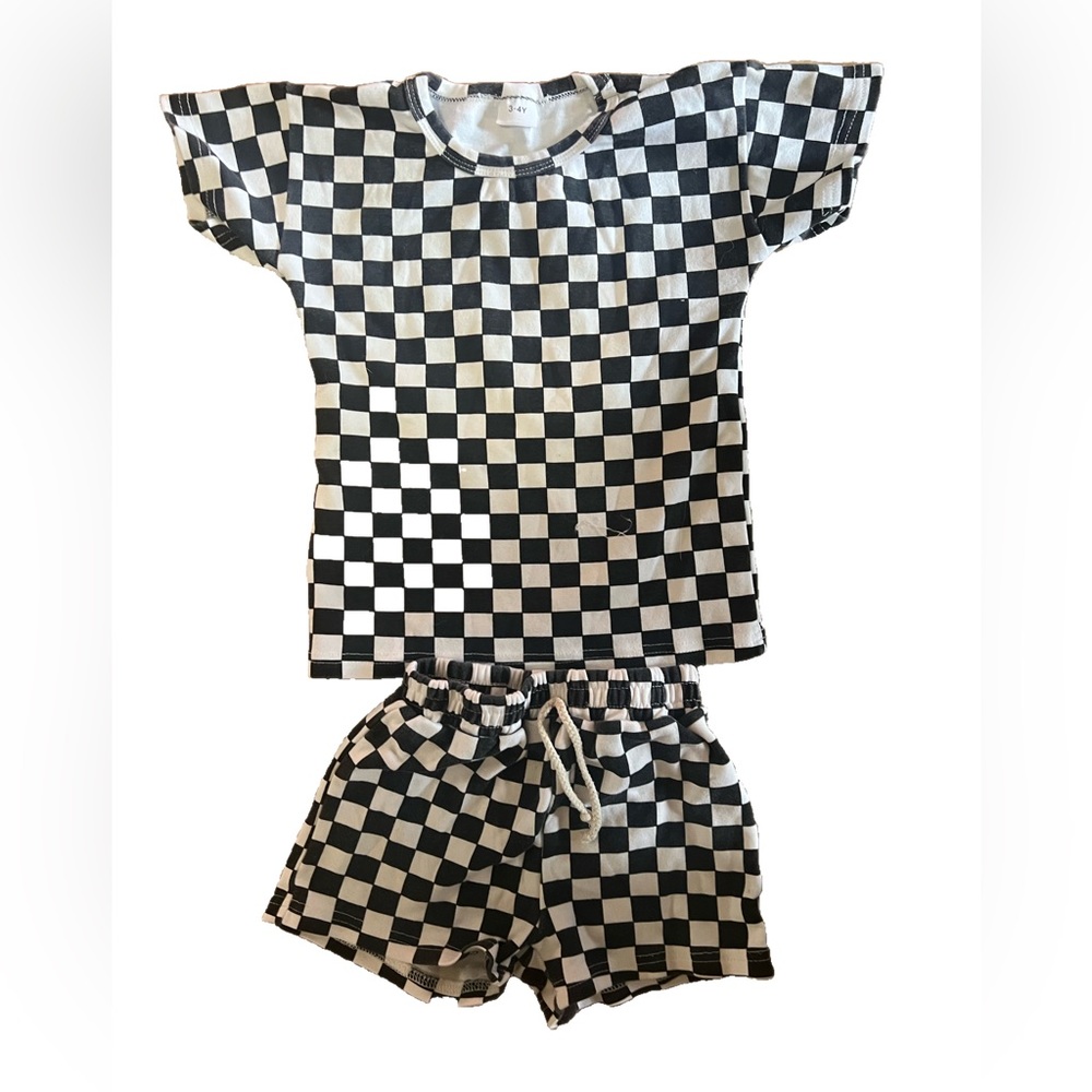 Black and white checkered marching set. Size 3-4y.